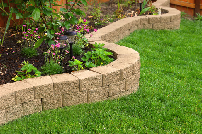 Stackable stone block garden edging, a modular option for creating raised, defined borders