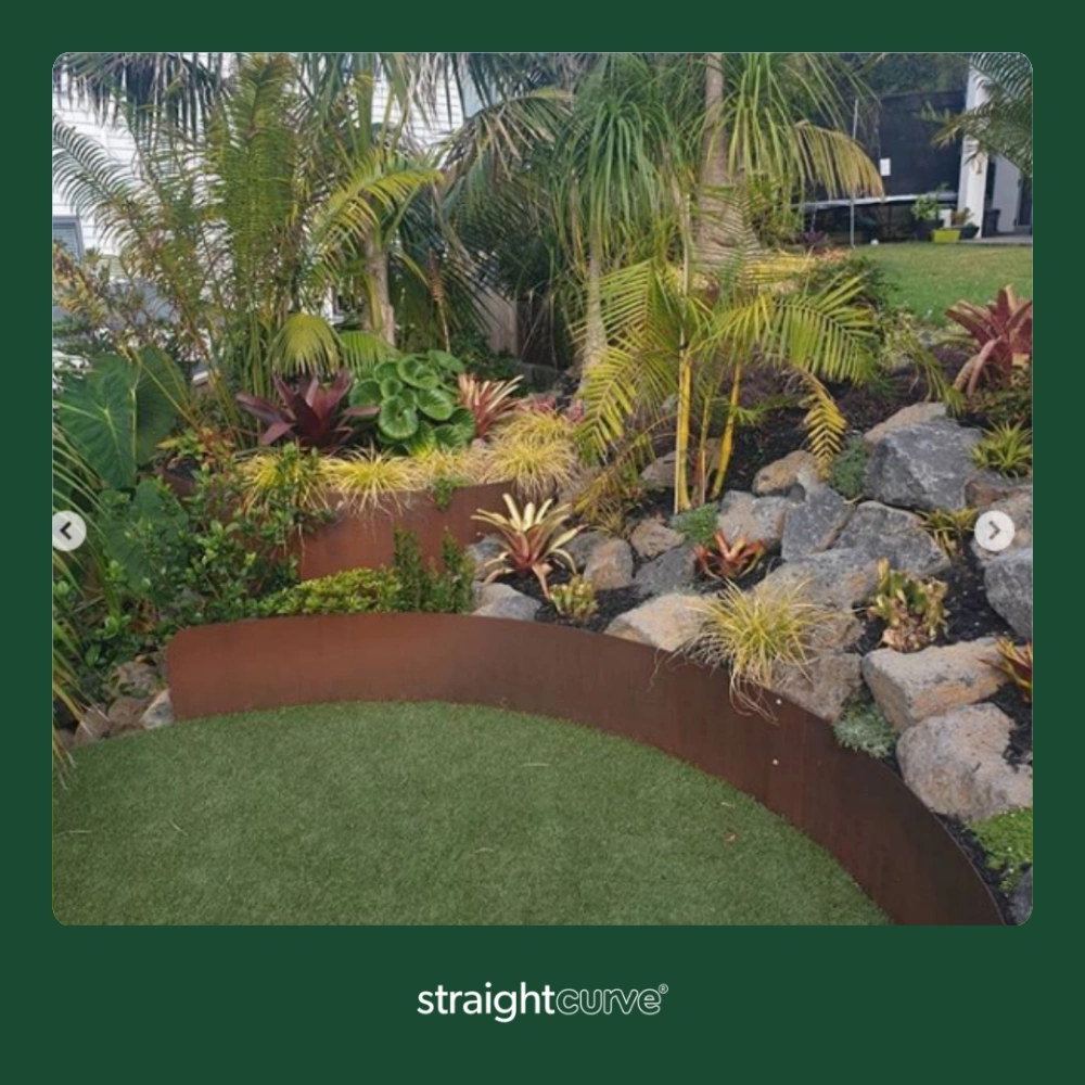 Straightcurve Flex raised garden bed used to create a rockery feature, the flexible panel system allows curved and organic shapes